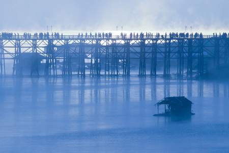 Wooden bridge of Sangklaburi in Kanjanaburi province,Thailand, Morning day.の写真素材