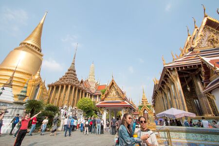 Bangkok, Thailand - February 10, 2018 :  Unidentified people are traveling and taking photos in the temple of Wat Phra Kaew at Grand Palace, Bangkok, Thailand.のeditorial素材