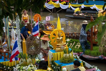 AYUTTHAYA, THAILAND - July 27, 2018 : Traditional parading of candles to temple by the river ceremony on The Buddhist Lent Day.のeditorial素材