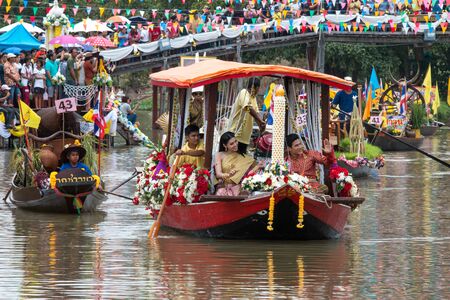 AYUTTHAYA, THAILAND - July 27, 2018 : Traditional parading of candles to temple by the river ceremony on The Buddhist Lent Day.のeditorial素材