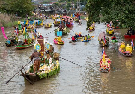 AYUTTHAYA, THAILAND - July 27, 2018 : Buddhists do candle festival parade by boat at Ladchado canal in Phra Nakhon Si Ayutthaya Province, Thailand.のeditorial素材