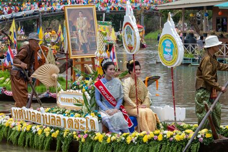AYUTTHAYA, THAILAND - July 27, 2018 : Traditional parading of candles to temple by the river ceremony on The Buddhist Lent Day.のeditorial素材