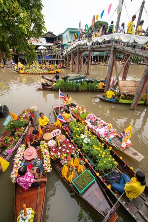 AYUTTHAYA, THAILAND - July 27, 2018 : Traditional parading of candles to temple by the river ceremony on The Buddhist Lent Day.のeditorial素材