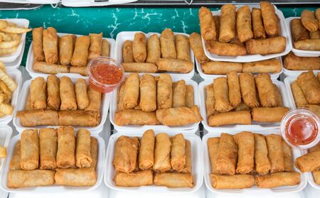 spring rolls on the local market at Chatuchak weekend market Bangkok, Thailand street food.のeditorial素材