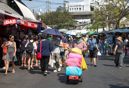 BANGKOK, THAILAND - February 23, 2019 : crowd of tourist and people shopping in Chatuchak outdoor street weekend market, this place is a famous and popular travel destination in Bangkok.のeditorial素材