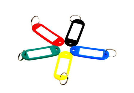 Group of colorful blank key tags isolated on white background