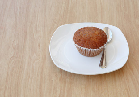 banana cake on the desk woodenの写真素材