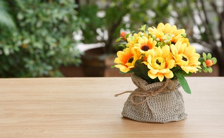 Decorative flower on wooden deskの写真素材