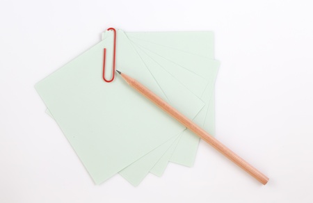 Colorful note paper with clips isolated on white backgroundの写真素材