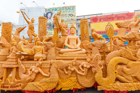 NAKHON RATCHASIMA, THAILAND - JULY 11 : The traditional candle procession festival of Buddha on July 11, 2014 in Nakhon Ratchasima, thailand.のeditorial素材
