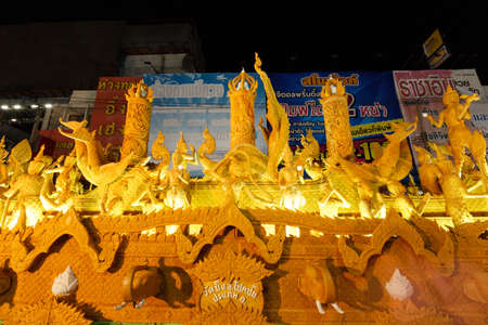 NAKHON RATCHASIMA, THAILAND - JULY 11 : The traditional candle procession festival of Buddha on July 11, 2014 in Nakhon Ratchasima, thailand.のeditorial素材