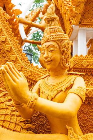Thai style candle wax carving in the traditional candle procession festival of Buddha, at  Nakhon Ratchasima,Thailandのeditorial素材