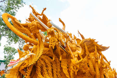 NAKHON RATCHASIMA, THAILAND - JULY 11 : The traditional candle procession festival of Buddha on July 11, 2014 in Nakhon Ratchasima, thailand.のeditorial素材