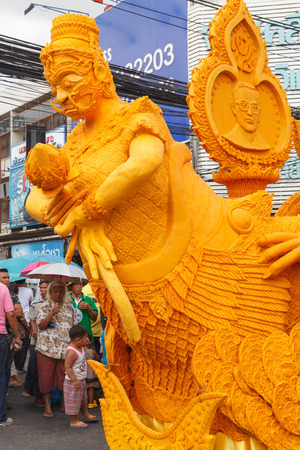 Nakhon Ratchasima, Thailand - July 12, 2014 : The traditional candle procession festival of Buddha on July 12, 2014 in Nakhon Ratchasima, thailand.のeditorial素材