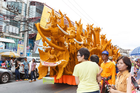 Nakhon Ratchasima, Thailand - July 12, 2014 : The traditional candle procession festival of Buddha...