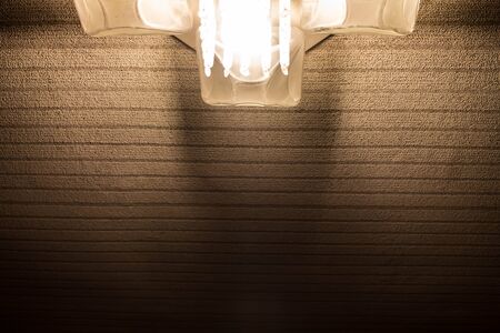 Soft light from the lamp on brown carpetの写真素材