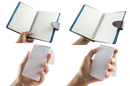 Men's hand holding Notebook isolate on a white background with blank screen and can be add your texts or others on Notebook.Notebook concept.の写真素材
