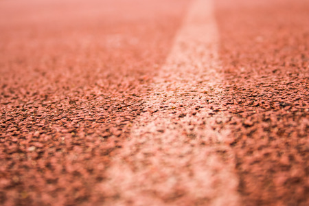 orange lane with white line backgroundの写真素材