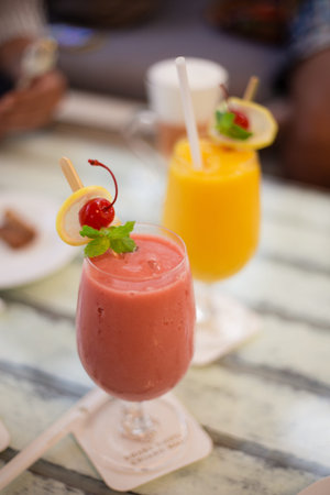 Fresh smoothies drinks in two glasses