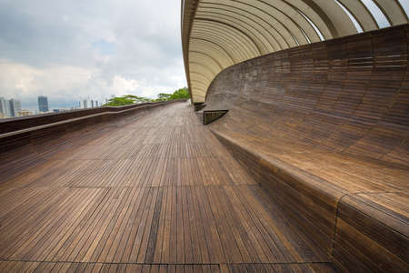 Modern pedestrian bridge connecting parksの写真素材