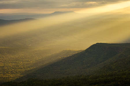 Majestic sunset in the mountains landscape, Phu Kradueng national park, Loei Thailandの写真素材