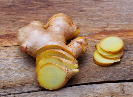 fresh ginger on wooden table