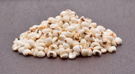millet grains on the wooden floor