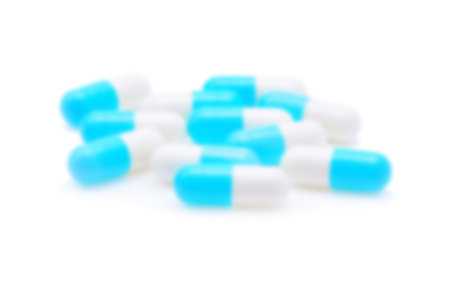 Pills blur isolated on white background