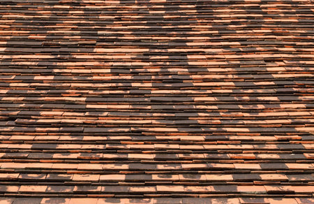 Old brick roof tiles backgroundの写真素材
