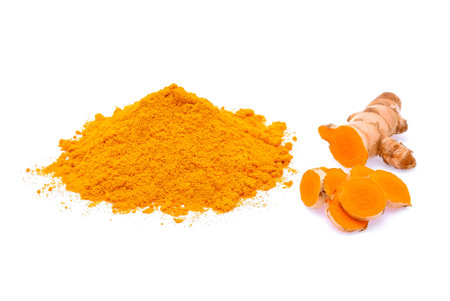 Turmeric roots and turmeric powder on white background