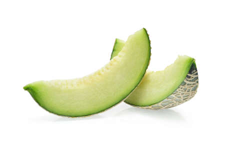 Slices of melon isolated on white background.の写真素材