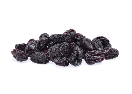 Black raisin isolated on white backgroundの写真素材