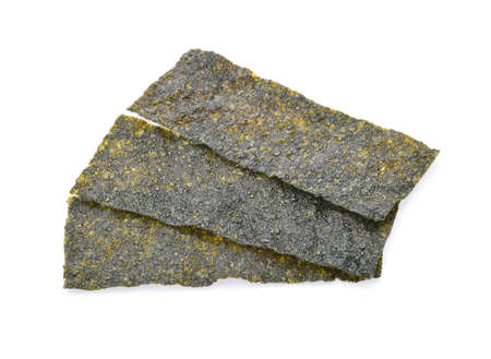 Sheet of dried seaweed, Crispy seaweed isolated on white background.の写真素材