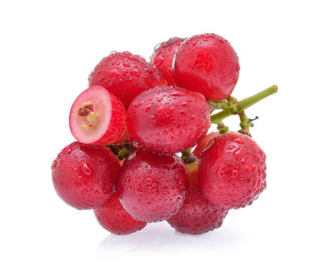 Red grapes with water drops isolated on white background.の写真素材