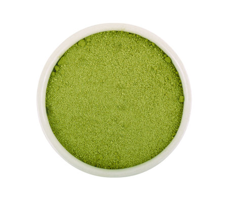 Top view of green tea powder on white background.の写真素材
