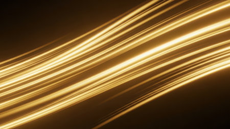 A close-up image of golden streaks of light against a dark background, creating a sense of motion and energy.の素材