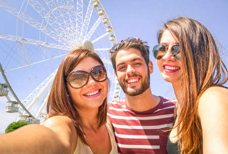 Best friends freezing a moment with selfie at the ferrys wheel-の写真素材