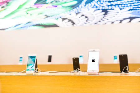 RIMINI , ITALY - October 3 , 2016: New iPhone 7 Plus models on display inside Apple store located in a shopping center on Via Caduti di Nassiriya Rimini, ITALY.のeditorial素材