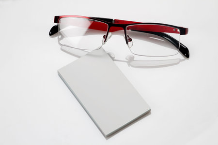 Blank business card with eyeglasses for mockup