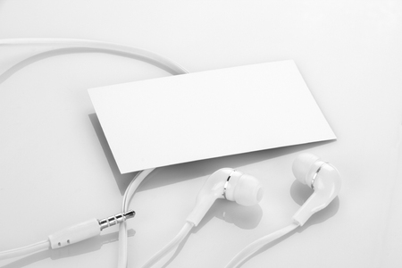 Blank Business Card with Earphones / Headphonesの写真素材