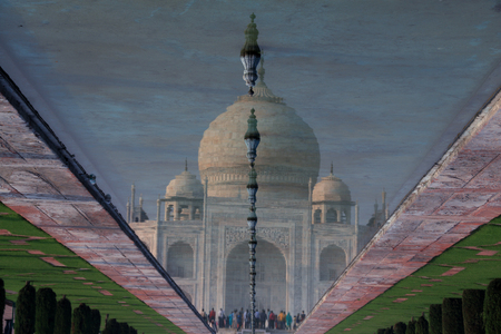 Reflection of Taj Mahal in Fountain Water, Agra, Indiaの写真素材