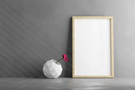 Wooden Photo Frame Mockup with a Flower Vase on Grey Background - 3D Illustrationの写真素材