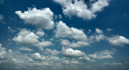 A menagerie of clouds in the blue skyの写真素材