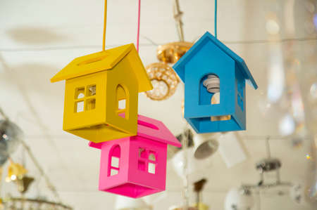 childrens chandelier from colorful housesの写真素材