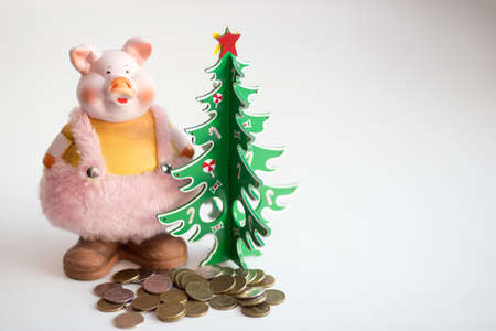 Pink piglet near the green treeの写真素材