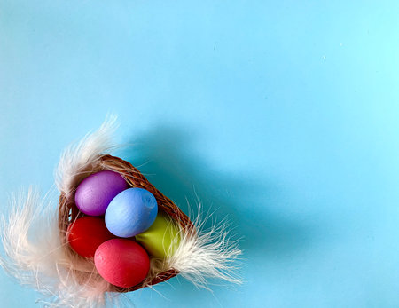 colored festive easter eggs on a colored background