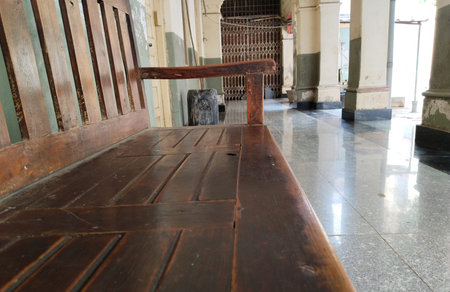 waiting hall with long wooden chair in Indian hospitalの写真素材