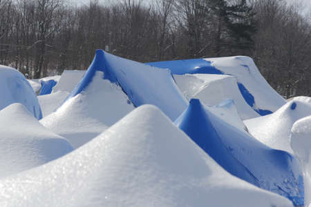 Plastic shrink wrap on boats, to protect boats and interior of boats from the winter elements.の写真素材