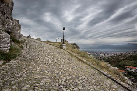 road from stone blocks, which leads to the top of the fortressの写真素材