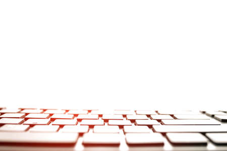 Keyboard close-up in a front of monitor. Keyboard with copy space .の写真素材